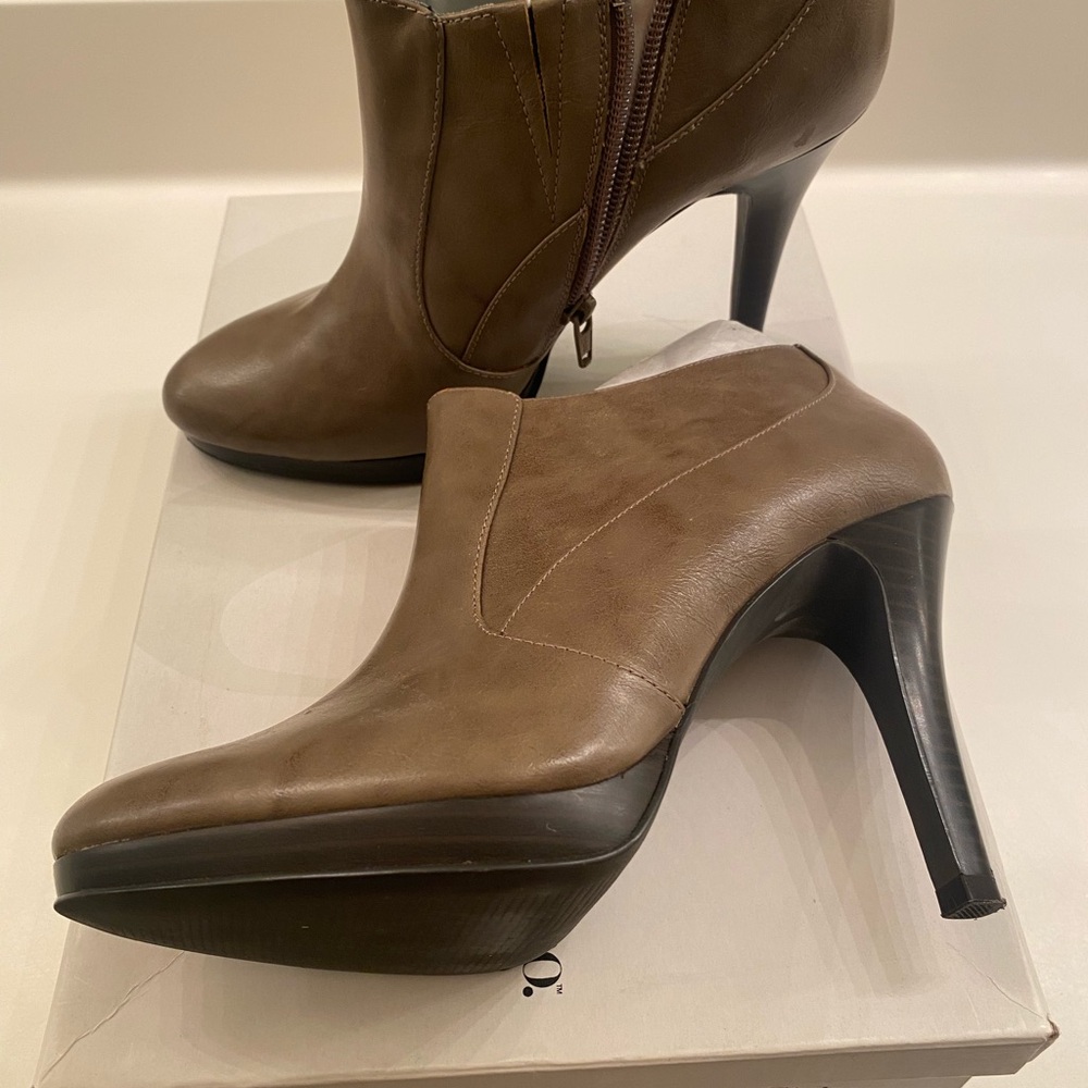 Stylish and classic taupe ankle high heel boots